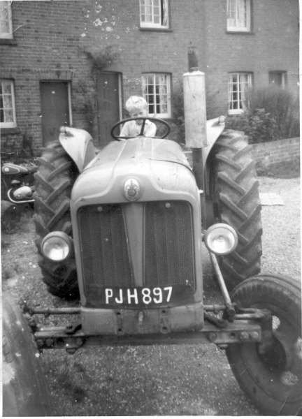 Totts-Lane-in-the-1950s-taken-from-the-allotment-gate-looking-toward-No-14.-Roger-Dunz-on-tractor